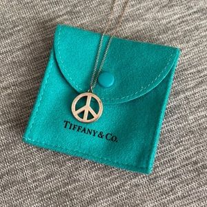 Tiffany & Co peace sign necklace